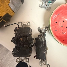 Unsafe-Electrical-Failure-Revealed-Behind-Wall-Plate 1